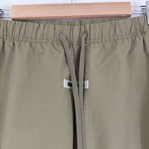 フェイアーオブゴッド エッセンシャルズ FEAR OF GOD ESSENTIALS ナイロン トラックパンツ メンズ JPN:XS