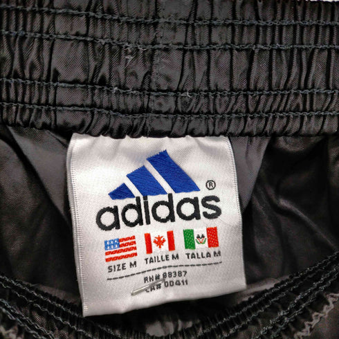 アディダス adidas 万国旗タグ サイドボタン トラックパンツ メンズ JPN:M