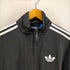 アディダス adidas トレフォイルロゴサイドラインハイネックトラックジャケット メンズ JPN:L