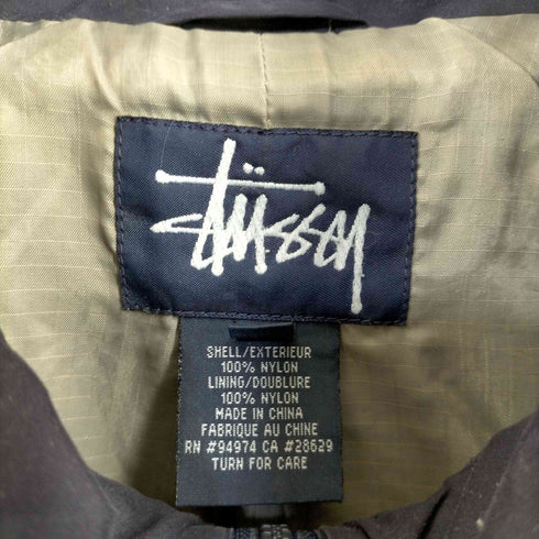 ステューシー Stussy 紺タグ 胸ロゴ グリフィン刺繍 ナイロンジャケット メンズ import:L