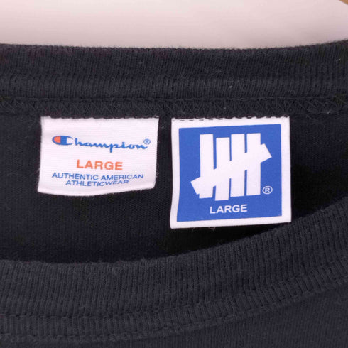 アンディフィーテッド UNDEFEATED DISTRESSED LOGO LS TEE ディストレスロゴクルーネックカットソー メンズ import:L