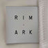 リムアーク RIM.ARK アシンメトリー タートルネック カットソー レディース