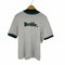 ドロールドムッシュ DROLE DE MONSIEUR フロッキーロゴリボンリンガーTシャツ メンズ JPN:M