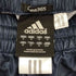 アディダス adidas ロゴ刺繍 サイドライン ウィンドブレーカーパンツ CLIMAPROOF メンズ JPN:M