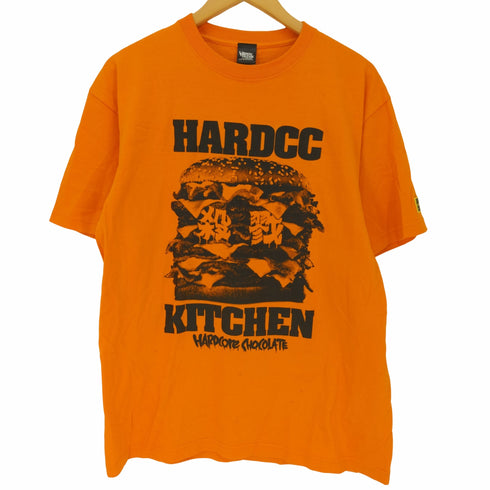 ハードコアチョコレート HARDCORE CHOCOLATE HARDCCキッチン 殺戮 チーズバーガー DEATHカロリーオレンジ Tシャツ メンズ JPN:XL