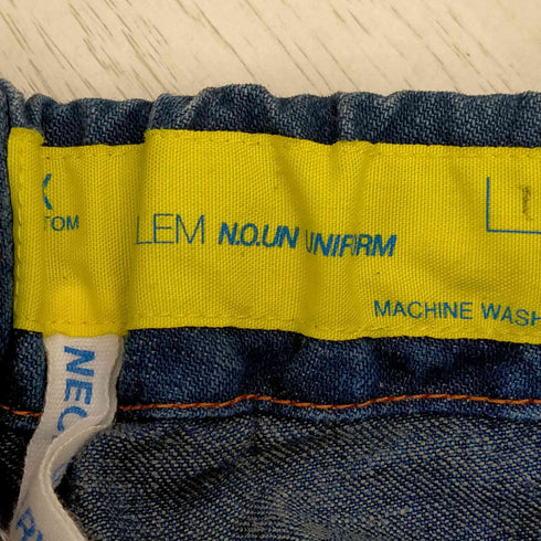 ネセサリーオアアンネセサリー OZLEM. Necessary or Unnecessary デニムイージーパンツ メンズ 1