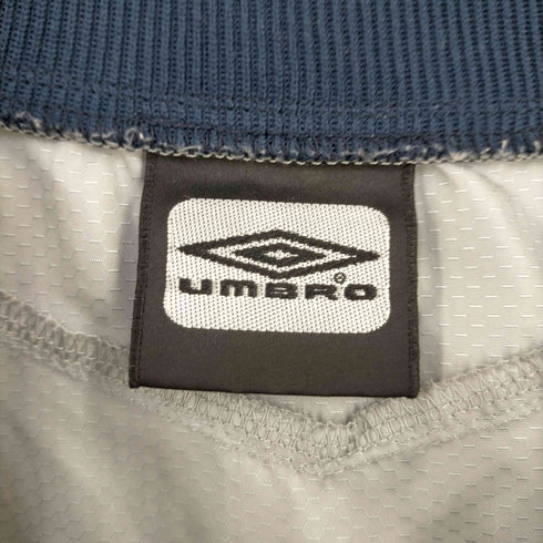 アンブロ UMBRO デサント製 両面プリント ナイロンプルオーバー ピステ メンズ O-XO