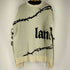 ホワイトランド WHITELAND 総柄クルーネックニット メンズ import:M