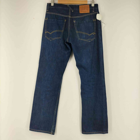 トミーヒルフィガー TOMMY HILFIGER カウレザーパッチ オフセット インディゴボタンフライ ストレートデニム メンズ 32/32