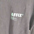 アフィックス AFFIX STANDARDISED LOGO LONG SLEEVE TEE クルーネック プリントロングカットソー メンズ JPN:M