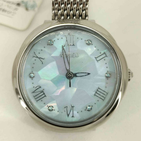 セイコーワイアード SEIKO WIRED クォーツ腕時計 花型ケース 白蝶貝文字盤 レディース
