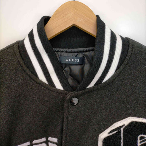 ゲス GUESS LHP別注 ワッペンロゴスタジャン メンズ import:L