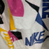 ナイキ NIKE ロゴプリントプルオーバーパーカー メンズ JPN:L
