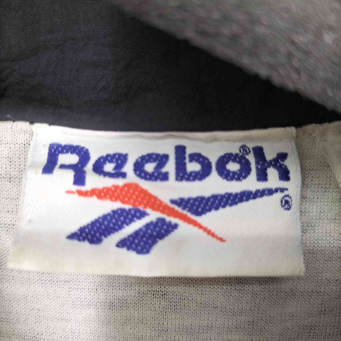 リーボック Reebok フロントロゴ ハイネック比翼ワッシャーナイロンブルゾン メンズ 2XL
