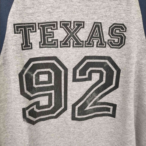 TEXAS 92 TEXAS GUITAR SHOWS INC 両面プリントナンバリングラグランカットソー メンズ