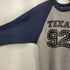 TEXAS 92 TEXAS GUITAR SHOWS INC 両面プリントナンバリングラグランカットソー メンズ