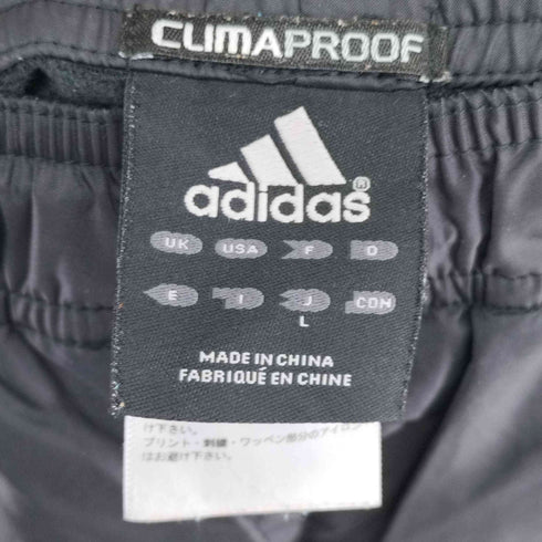 アディダス adidas CLIMAPROOF 裏起毛サイドライントラックパンツ メンズ JPN:L