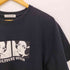 デリバリーヘルズ フラッグスタッフ Delivery Hells(FLAGSTUFF) プリント Tシャツ メンズ JPN:L