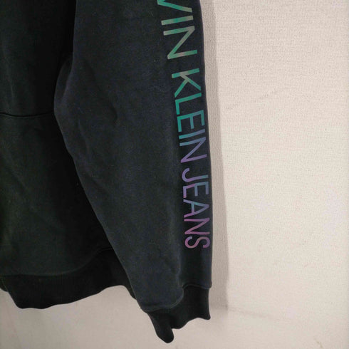 カルバンクラインジーンズ Calvin Klein Jeans ホログラムロゴプリントプルオーバーフーディー メンズ JPN:L