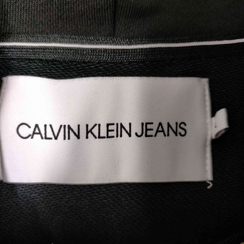 カルバンクラインジーンズ Calvin Klein Jeans ホログラムロゴプリントプルオーバーフーディー メンズ JPN:L