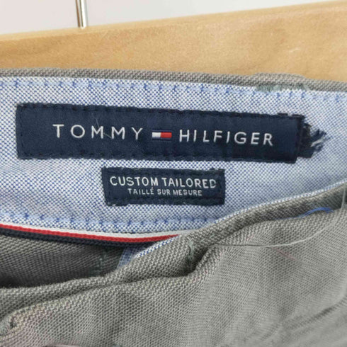 トミーヒルフィガー TOMMY HILFIGER CUSTOM TAILORED ノータックテーパードスラックス TH ZIPPER メンズ