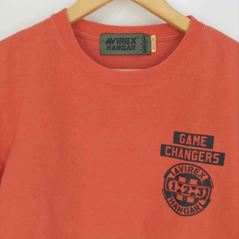 アヴィレックス AVIREX HANGAR GAME CHANGERS T-SHIRT ハンガー ゲーム チェンジャース Tシャツ メンズ JPN:M