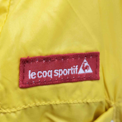 ルコックゴルフ Le coq sportif GOLF ウルビルド4D HEAT NAVI ブレーカー ナイロン パンツ レディース JPN:L