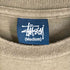 ステューシー Stussy 袖裾シングルステッチ MOVIN ON ロゴTシャツ メンズ JPN:M