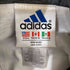 アディダス adidas 万国タグ パフォーマンスロゴ ナイロンジャケット メンズ import:L