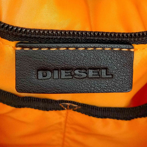ディーゼル DIESEL デニム地メタルロゴスクエアバックパック メンズ