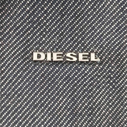 ディーゼル DIESEL デニム地メタルロゴスクエアバックパック メンズ