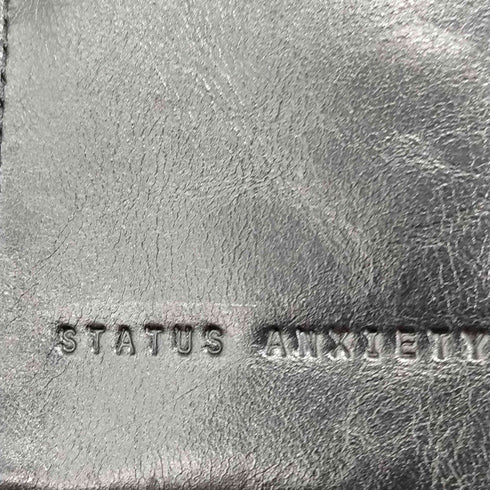 ステータスアングザエティ status anxiety レザー三つ折り ロングウォレット メンズ