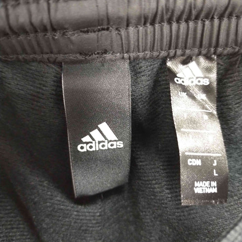 アディダス adidas ウインドパンツ Wadidas24/7テーパードウィンドパンツ メンズ JPN:L