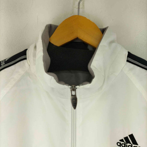 アディダス adidas 胸元ワンポイント刺繍サイドラインウィンドブレーカー メンズ JPN:M