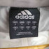 アディダス adidas 胸元ワンポイント刺繍サイドラインウィンドブレーカー メンズ JPN:M