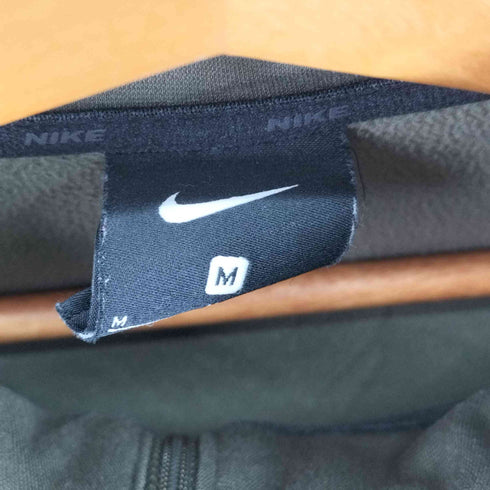 ナイキ NIKE ワンポイントスウォッシュハーフジップトップス メンズ import:M