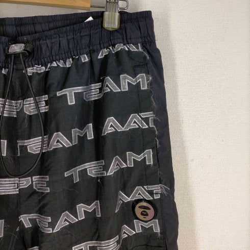 エーエイプバイアベイシングエイプ AAPE BY A BATHING APE WOVEN PANTS 総柄トラックパンツ メンズ JPN:L