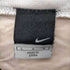 ナイキ NIKE 00S バックスウォッシュロゴ ウレタン加工ナイロンプルオーバー レディース import:L