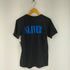 AGAINST 両面プリント S/S Tシャツ メンズ import:L