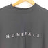 ニコアンド Niko and... NUMERALS ロゴプリント クルーネックTシャツ メンズ JPN:M
