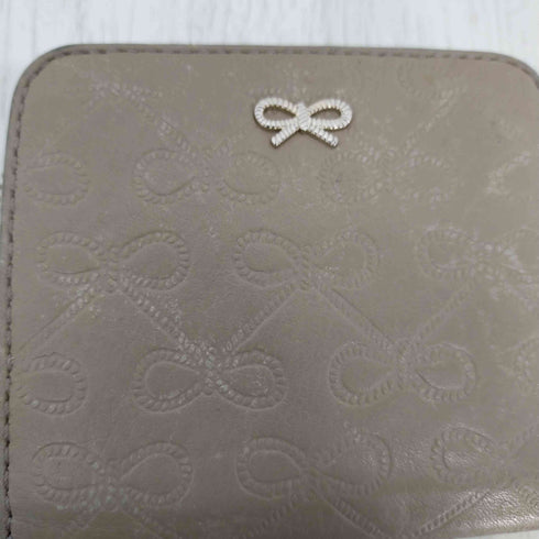 アニヤハインドマーチ ANYA HINDMARCH MAEVE MEDIUM 財布 二つ折り レザー ロゴ型押し レディース