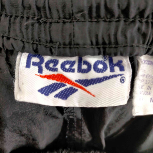 リーボック Reebok ナイロンパンツ メンズ JPN:M