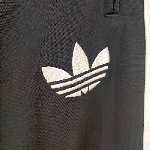 アディダス adidas フロントトレフォイルロゴ刺繍 サイドライントラックパンツ メンズ JPN:S