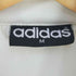 アディダス adidas 万国旗タグ トレフォイルロゴ刺繍 トラックジャケット メンズ import:M