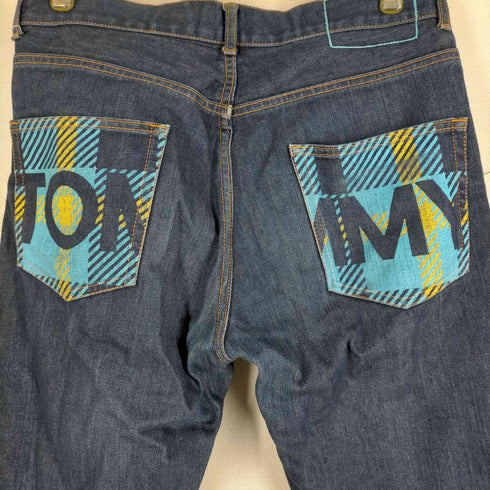 トミー TOMMY 裏地千鳥格子柄 バックポケットプリントデザインデニムパンツ メンズ JPN:M