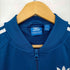 アディダスオリジナルス adidas Originals トラックジャケット SUPERGIRL TT バックプリント レディース JPN:L
