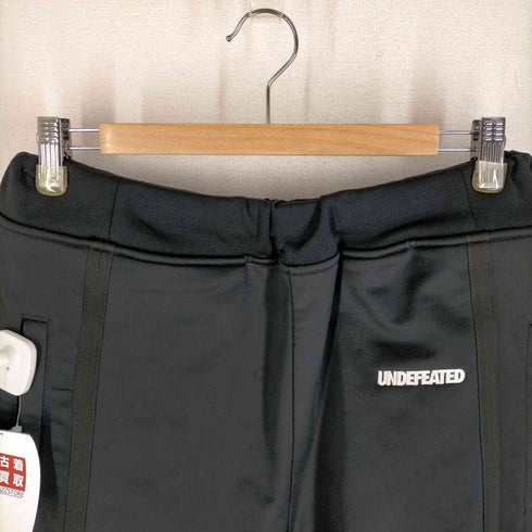 アンディフィーテッド UNDEFEATED ロゴ刺繍トラックパンツ メンズ JPN:L