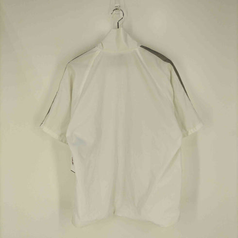 ステューシー Stussy 90-00s USA製 赤青タグ ショーンフォント リフレクターテープ 裏地メッシュ 半袖ジップアップジャケット メンズ import:M