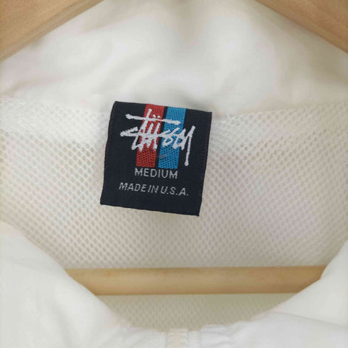 ステューシー Stussy 90-00s USA製 赤青タグ ショーンフォント リフレクターテープ 裏地メッシュ 半袖ジップアップジャケット メンズ import:M