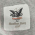 マークマクネイリーフォアヘザーグレイウォール Mark Mcnairy for Heather Grey Wall ロゴプリントS/S TEE メンズ